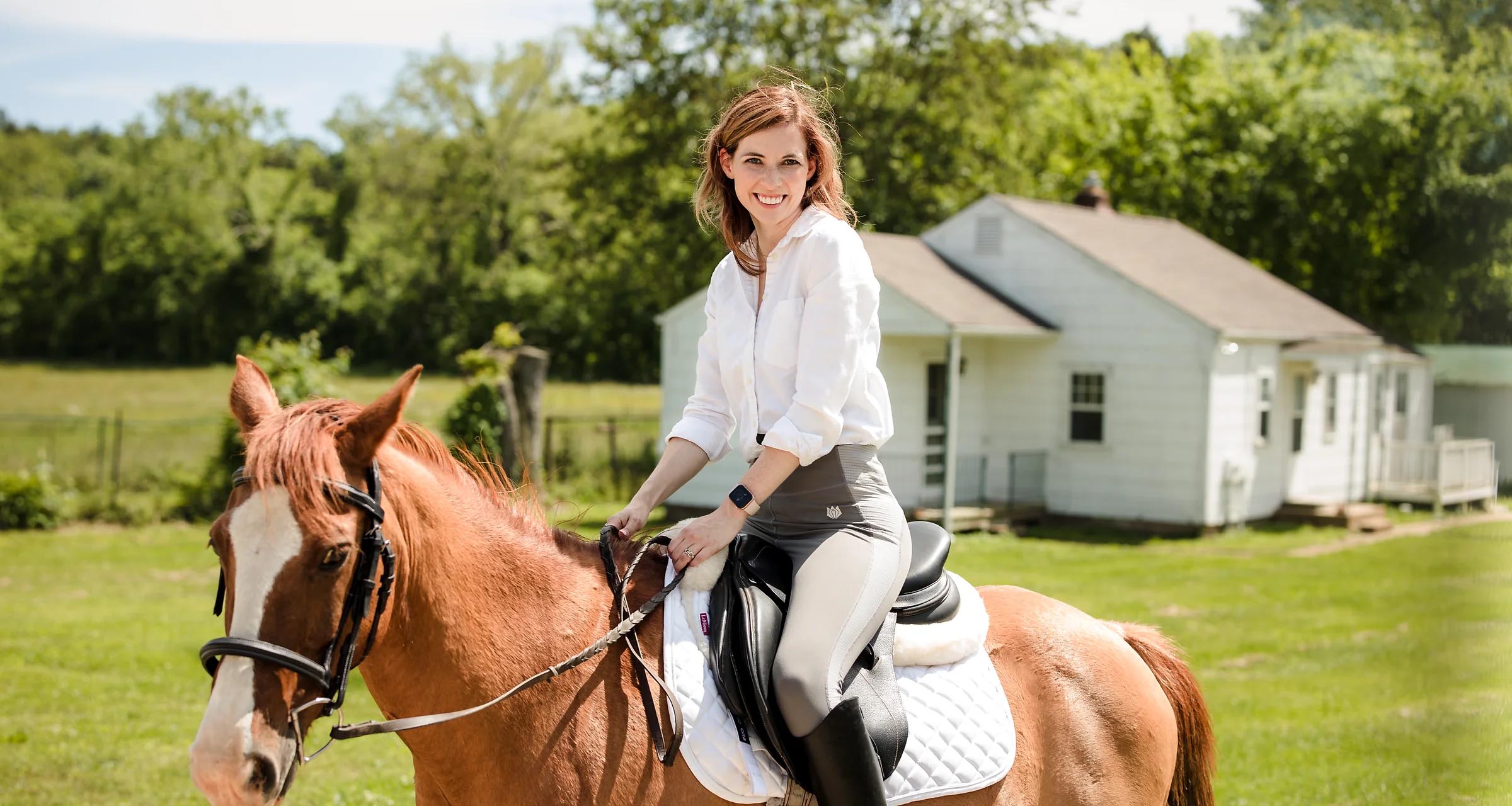 Attorney Amber Fitzgerald Riding a Horse